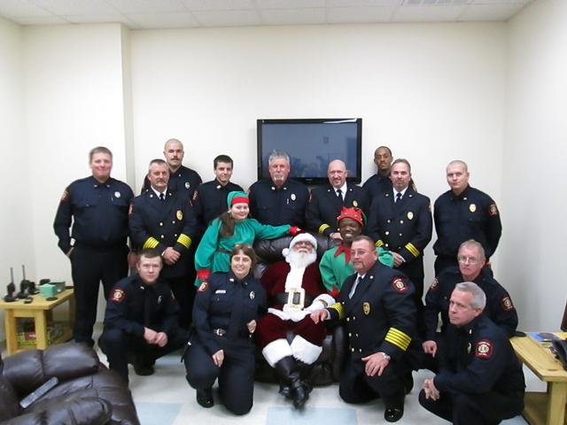 Some of Our Members with Santa and His Elves