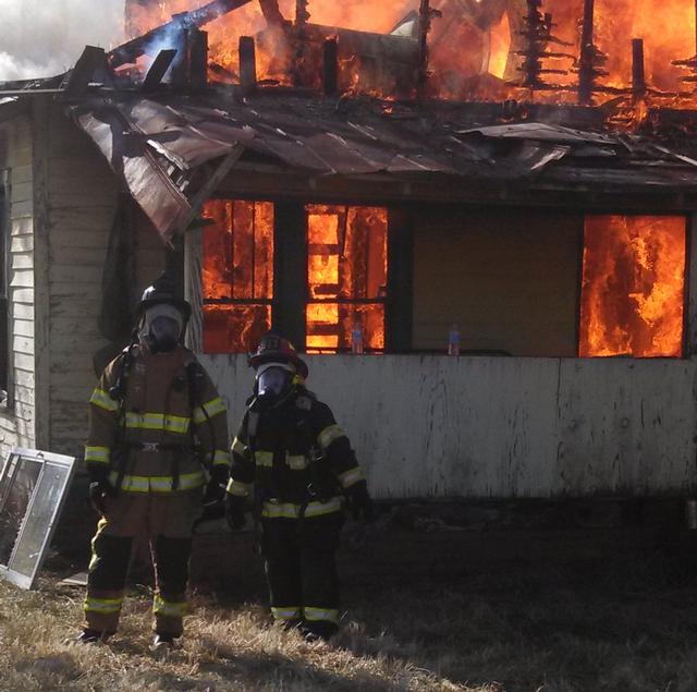 Firefighter Jamal Moore with Captain Mike Maine